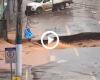 Flood collapses businesses and breaks asphalt after heavy rains in city of SC