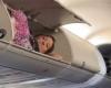 Woman “rests” in flight luggage compartment: image goes viral