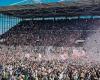 Fans from St. Pauli and Holstein Kiel celebrate their place in the Bundesliga with a pitch invasion | german football